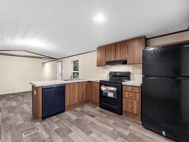 Foto del edificio - 8606 Yellow Poplar Ln