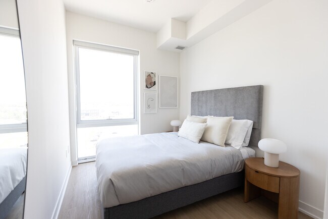 Photo du bâtiment - New Rental Living