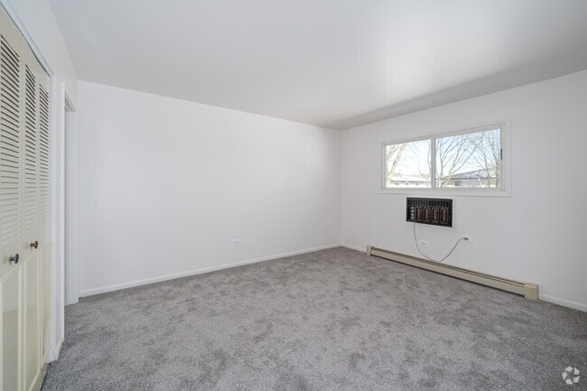 The Deluxe - 2BR, 1.5BA - 887SF - Primary Bedroom - Heritage Senior Apartments - 55 and over