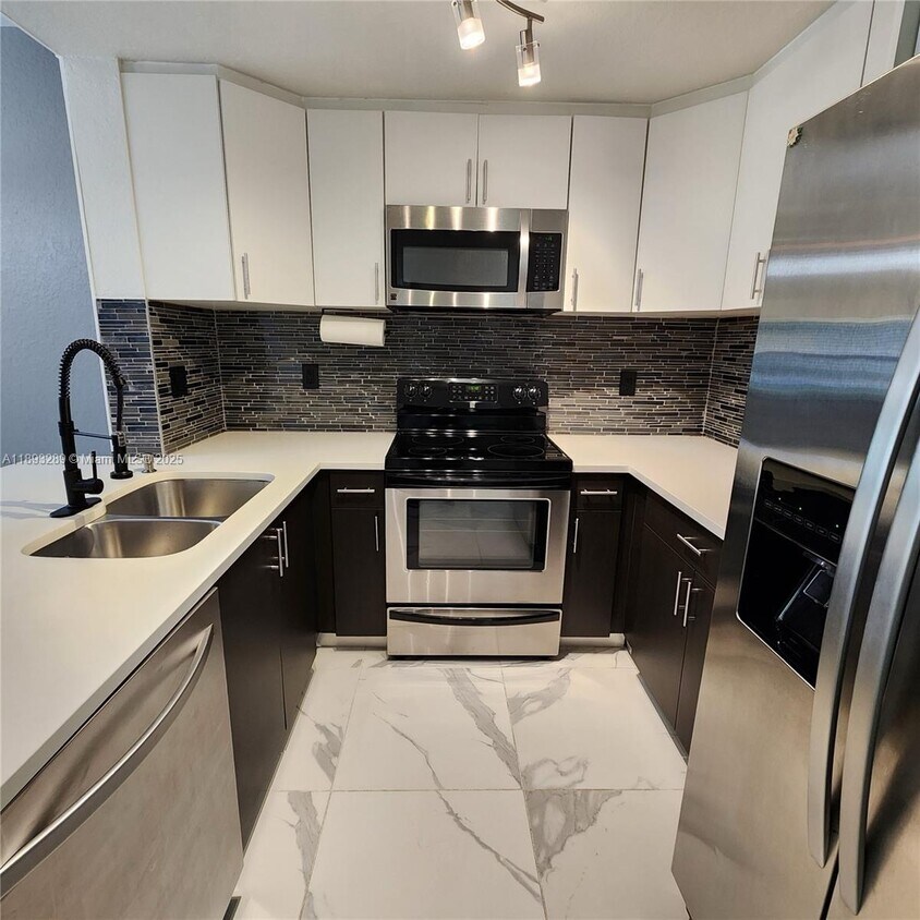 Photo - 2941 Riverside Dr # 102 CORAL SPRINGS, FL 33065