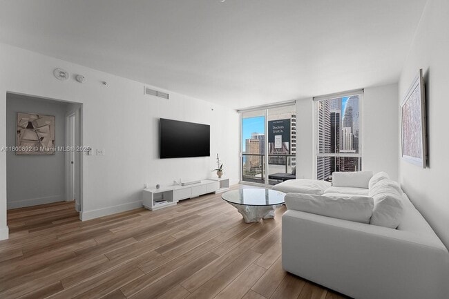 Living Room High Ceilings - 244 Biscayne Blvd Apartment