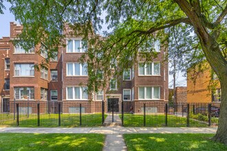 Building Photo - 7443-7445 S Paxton Ave