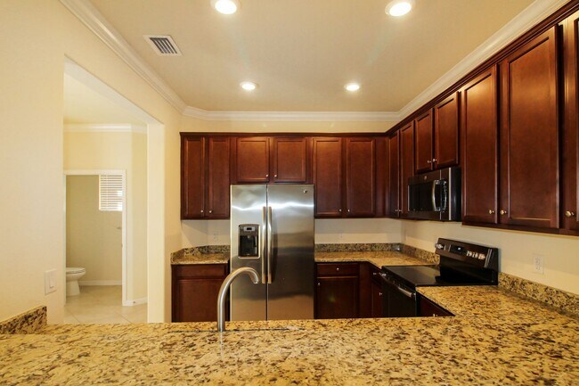 Building Photo - Gran Paradiso Annual Townhome for Rent