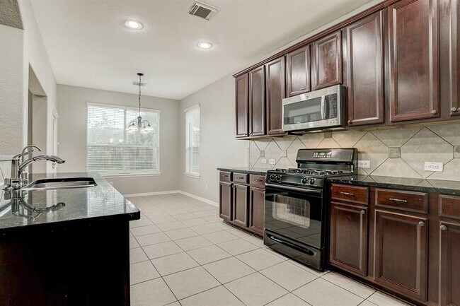 Building Photo - 2626 Canyon Falls Dr
