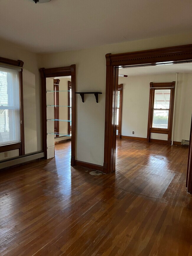 Dining room looking into large living room - 88 Leroy St