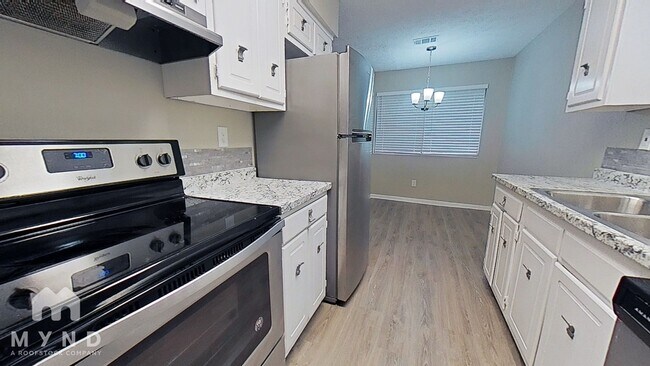 Building Photo - 9072 Woodgreen Way
