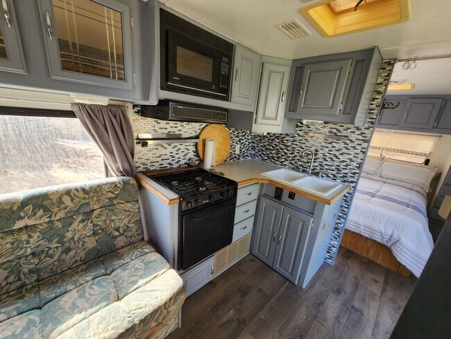 Building Photo - Work for rent as a caretaker of property a...