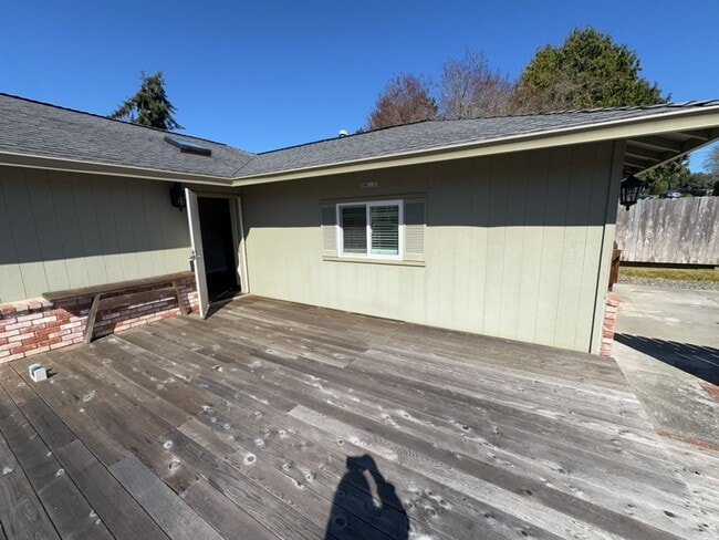 Building Photo - Newley updated 3-bedroom home features fenced yard, garage, and covered patios!