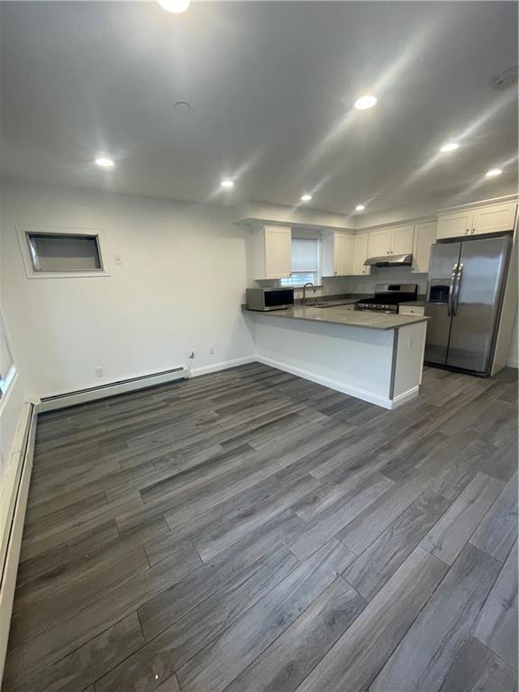 Foto del edificio - 1-98 Cross Bay Pkwy