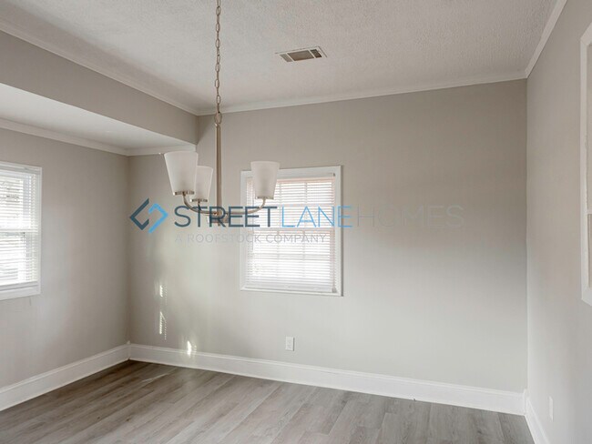 Building Photo - NOW OFFERING HALF OFF THE FIRST FULL MONTH...