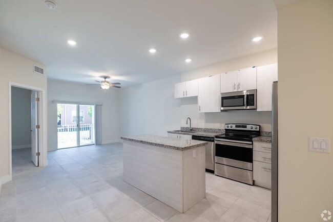 Building Photo - 3221-3409 SW 8th Pl