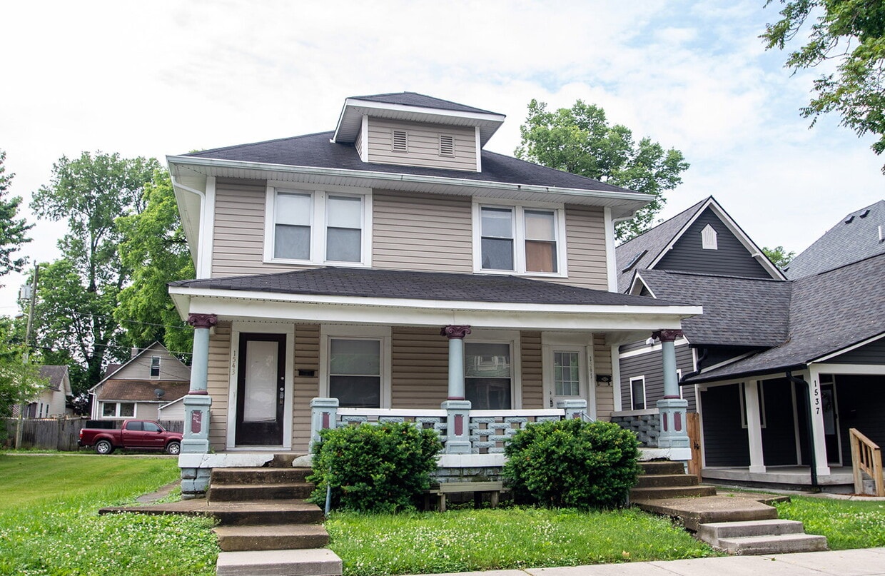 Primary Photo - "Charming 3-Bed Duplex Retreat on E Ohio S...