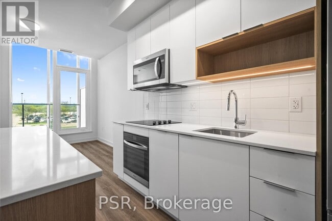 Photo du bâtiment - 4235-4235 Confederation Pkwy
