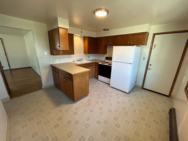Foto del edificio - 10311 - 10315 E 8th Ave