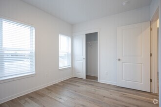 3 BR, 3 BA - 1120 SF - Elmwood Lake Apartments