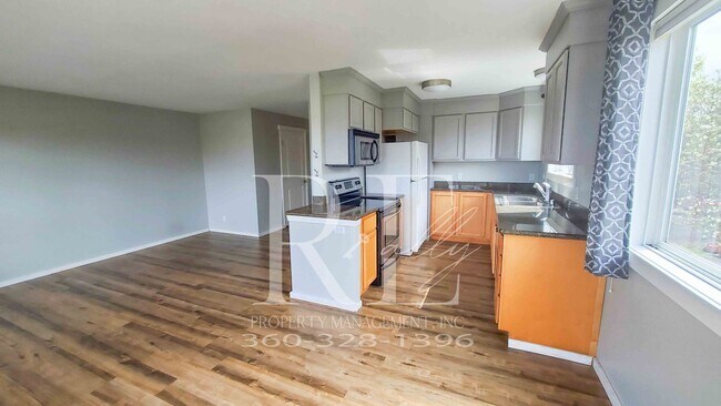 Building Photo - Modern Manette 1BR Condo with Private Pati...