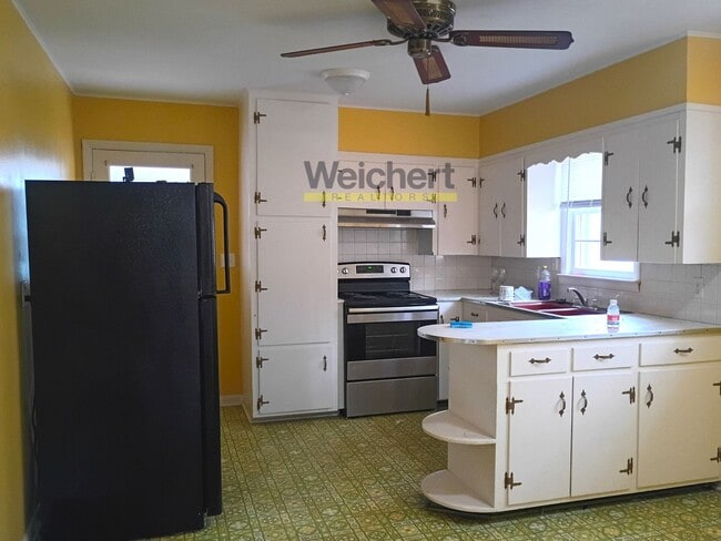 Foto del edificio - Cozy 2BR Home with Fenced Yard