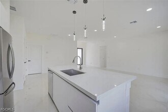Building Photo - 5905 Sunshine Blvd N