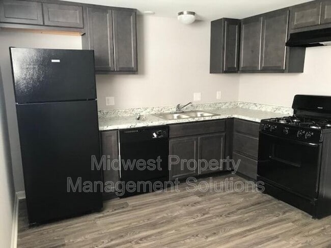 Building Photo - 1835 E 8th St