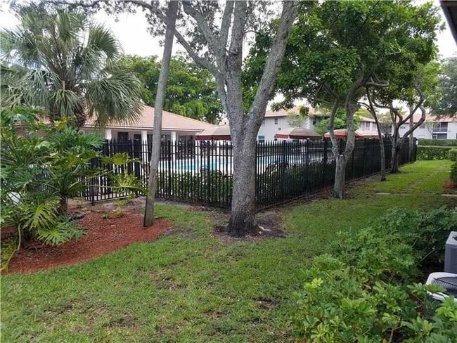 Building Photo - 8750 Royal Palm Blvd