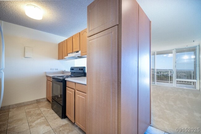 Building Photo - Remodeled 2BR/2BA/2 Covered Parking stalls...