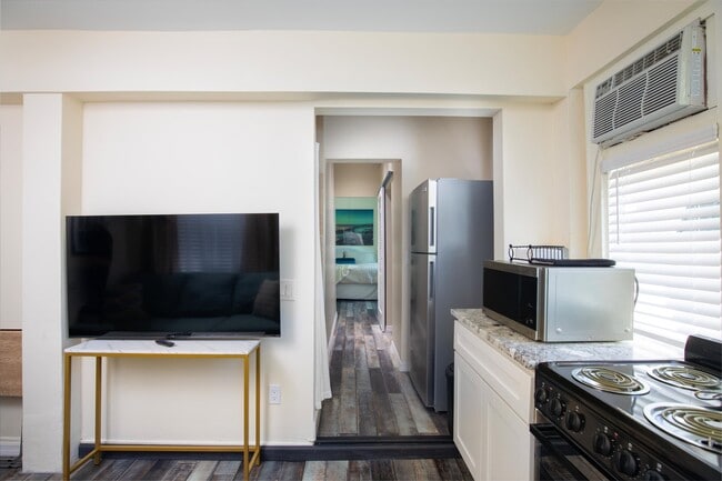 Living room TV & Kitchen/Hall - 1104 Grinnell St