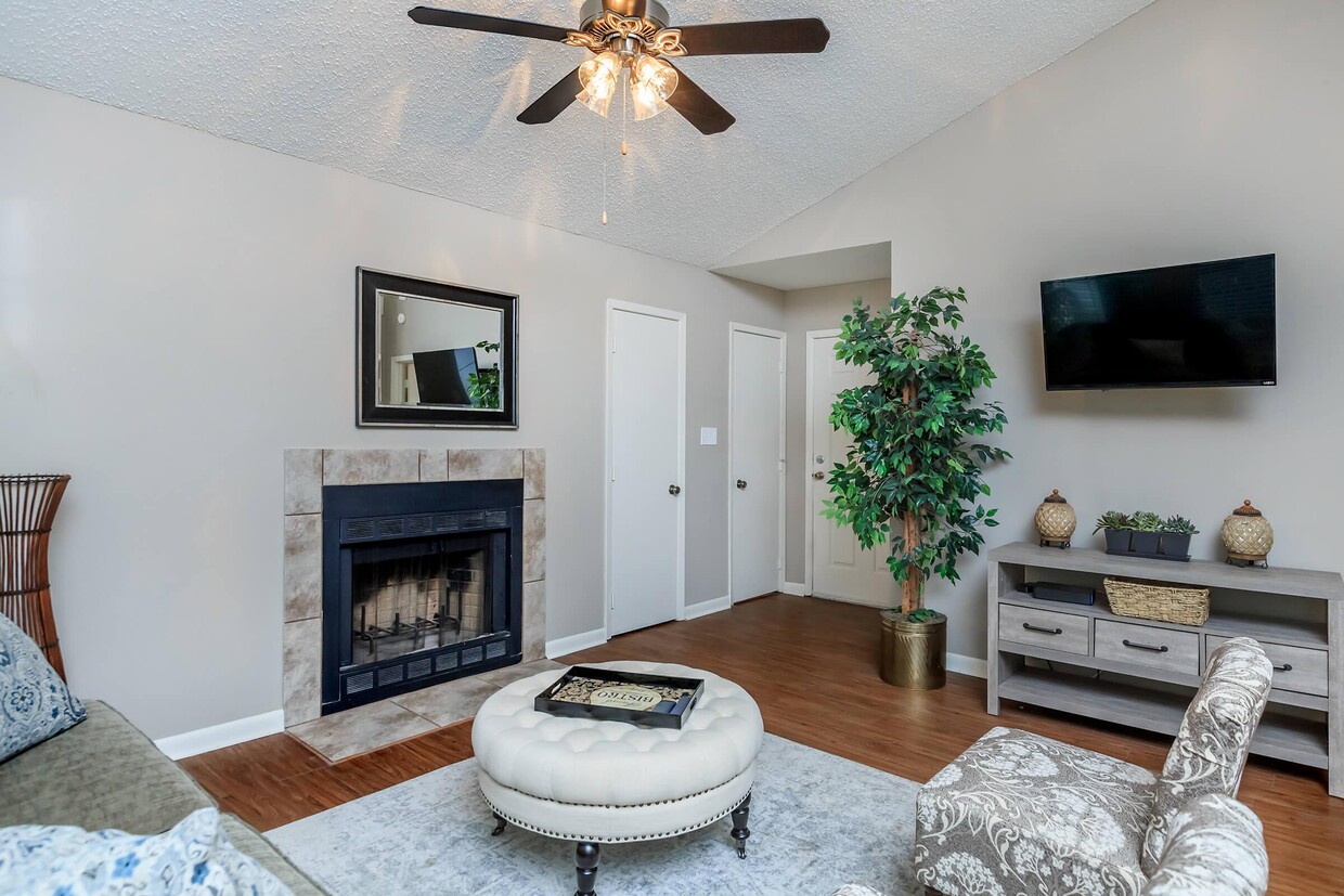 WOOD BURNING FIREPLACE IN APARTMENTS FOR RENT. - Village at Crossgates