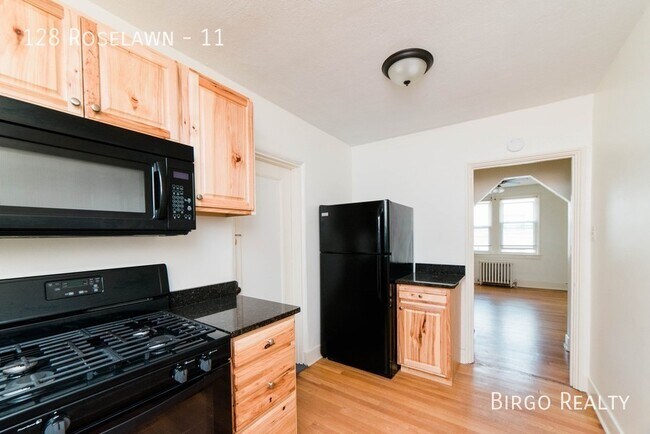 Building Photo - 1930s Elegance Meets Modern Comfort: Corne...