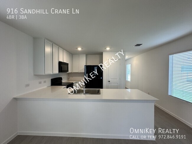 Foto del edificio - 916 Sandhill Crane Ln