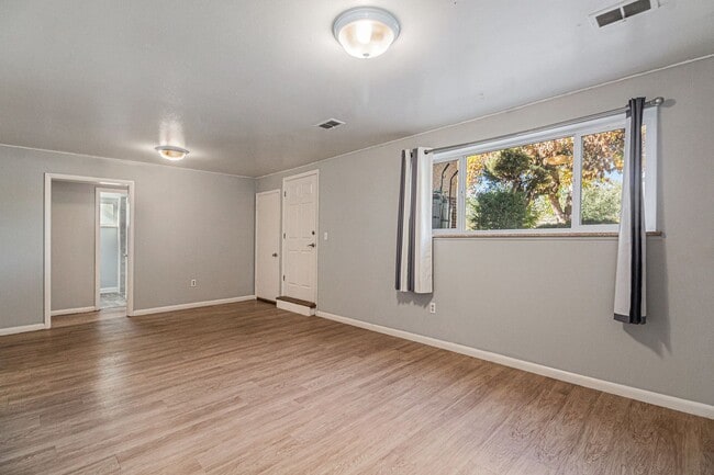 Photo - Spacious 2-Bedroom Garden-Level Apartment with Garage & In-Unit Laundry