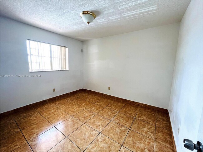 Building Photo - 6820 W Flagler St