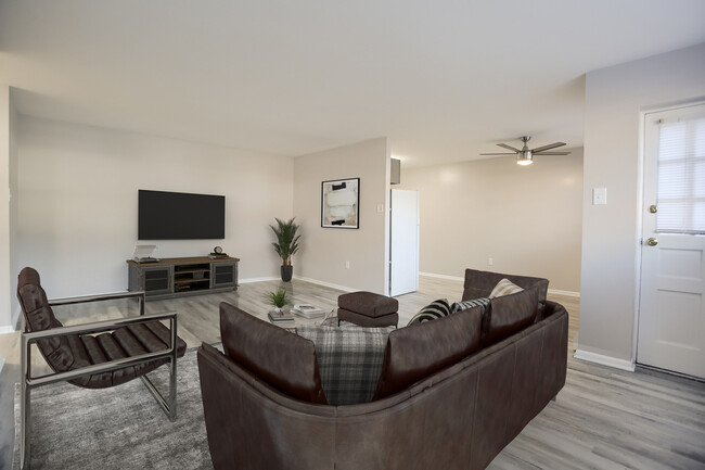 One Bedroom Deluxe Living Room - Edgewood Apartments