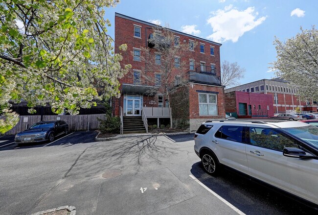 Back entrance and assigned off street parking - 755 Westminster St