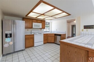 Building Photo - 6442 W Mesa Vista Ave