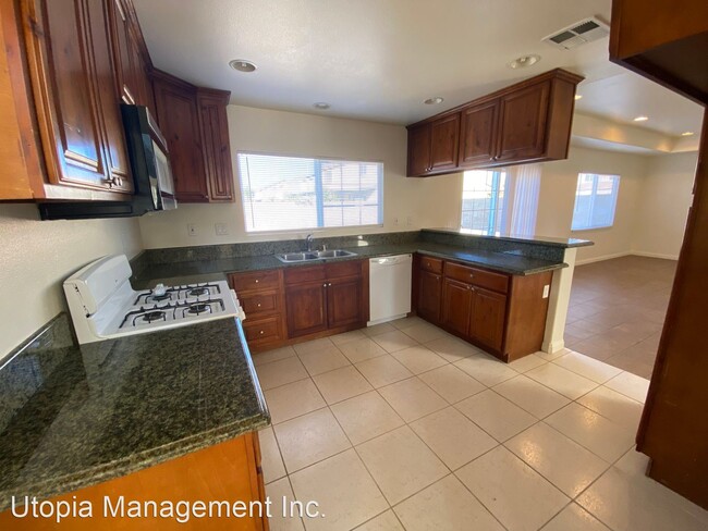 Building Photo - 4 br, 3 bath House - 2135 E. Nugent St.