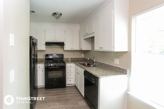 Building Photo - 6141 Woodthrush Dr