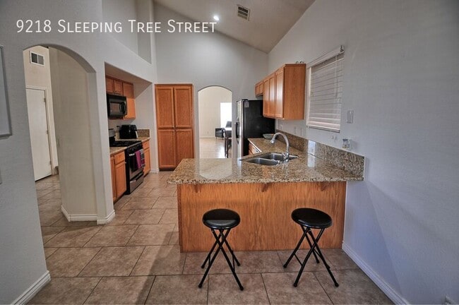 Building Photo - 9218 S Sleeping Tree St