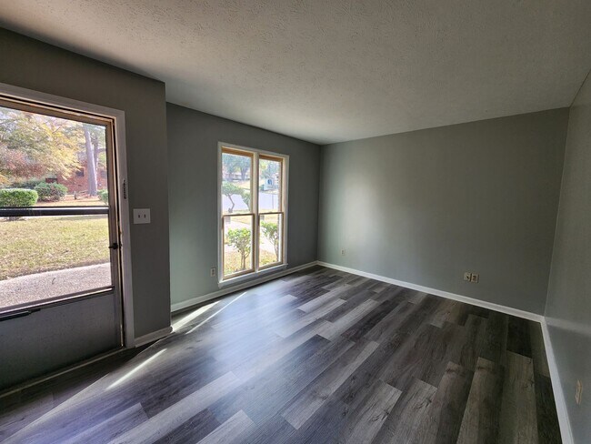 Building Photo - 3 Bedroom 2 Bath Carport on a Corner Lot