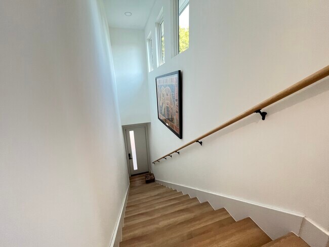 Bright and naturally lit stairs up the unit - 2496 Villanova Rd