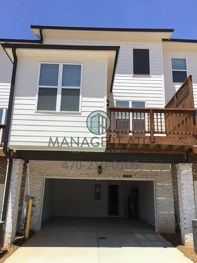 Photo - Elegant 3 Bedroom Townhome in a gated comm...