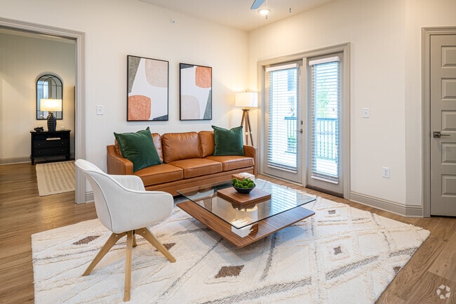 The Magnolia: 2BR, 2BA- Living Room - The Waters at Settlers Trace