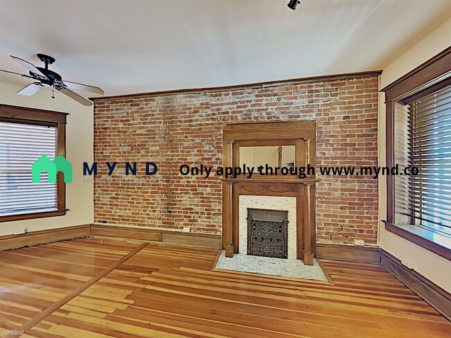 Building Photo - 1210 E Colfax Ave