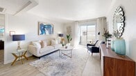 Located at 8600 Starboard Dr in Las Vegas, NV, this one-bedroom, one-bathroom residence offers a carefully designed layout that maximizes comfort and functionality. The open living room features light wood-style flooring, crown molding, and a sliding glass door that fills the space with natural light while providing direct access to a private balcony. The adjacent dining area is a well-defined space with a ceiling fan and ample room for a full dining set. The kitchen is outfitted with white shaker cabinetry, a classic subway tile backsplash, light countertops, and stainless steel appliances, including a refrigerator and dishwasher. The generously sized primary bedroom features plush carpeting, a large window, and an arched entryway leading to a dedicated walk-in closet with built-in shelving. The full bathroom includes wood-style tile flooring, a single vanity with white cabinetry, and a soaking tub with shower. Throughout the residence, a neutral color palette and consistent finishes create a cohesive and inviting ambiance, making this Las Vegas home a comfortable and practical living space.