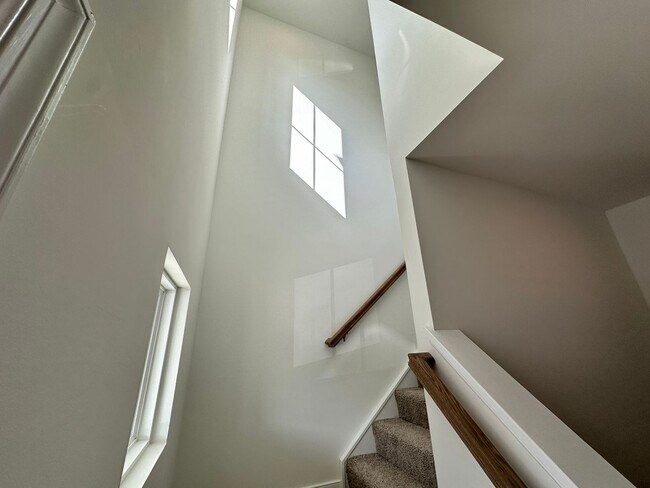 Building Photo - Charming Two-story Townhome, Boasting 3 Be...