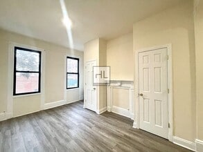 Building Photo - 51-28-51-35 35th St