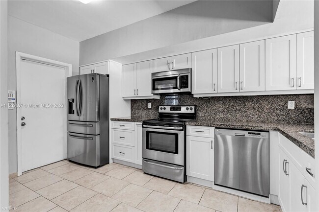Building Photo - 3 br, 2.5 bath House - 11824 SW 99th St
