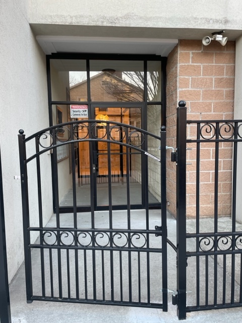 Fenced Entrance into Building - 3037 Brighton 6th St