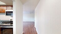 This well-designed apartment in Summit West offers a comfortable and functional living space. The unit boasts 860 square feet of total floor area on a single level, with two bedrooms and one bathroom. The primary bedroom is particularly spacious at 180 square feet, providing ample room for relaxation and storage.

Throughout the apartment, beautiful hardwood flooring adds warmth and elegance to each room. Ceiling fans in multiple rooms ensure good air circulation and comfort. Large windows in the bedrooms and living area flood the space with natural light, creating a bright and airy atmosphere.

The layout includes a central hallway connecting the various rooms, enhancing the flow of the space. Built-in closets in the bedrooms offer convenient storage solutions. The living area is open and versatile, ideal for various furniture arrangements. A sliding glass door in one room provides access to outdoor space, perfect for enjoying fresh air or expanding the living area.

With its practical design and attractive features, this Summit West apartment combines comfort and functionality in a well-proportioned 860 square foot package.