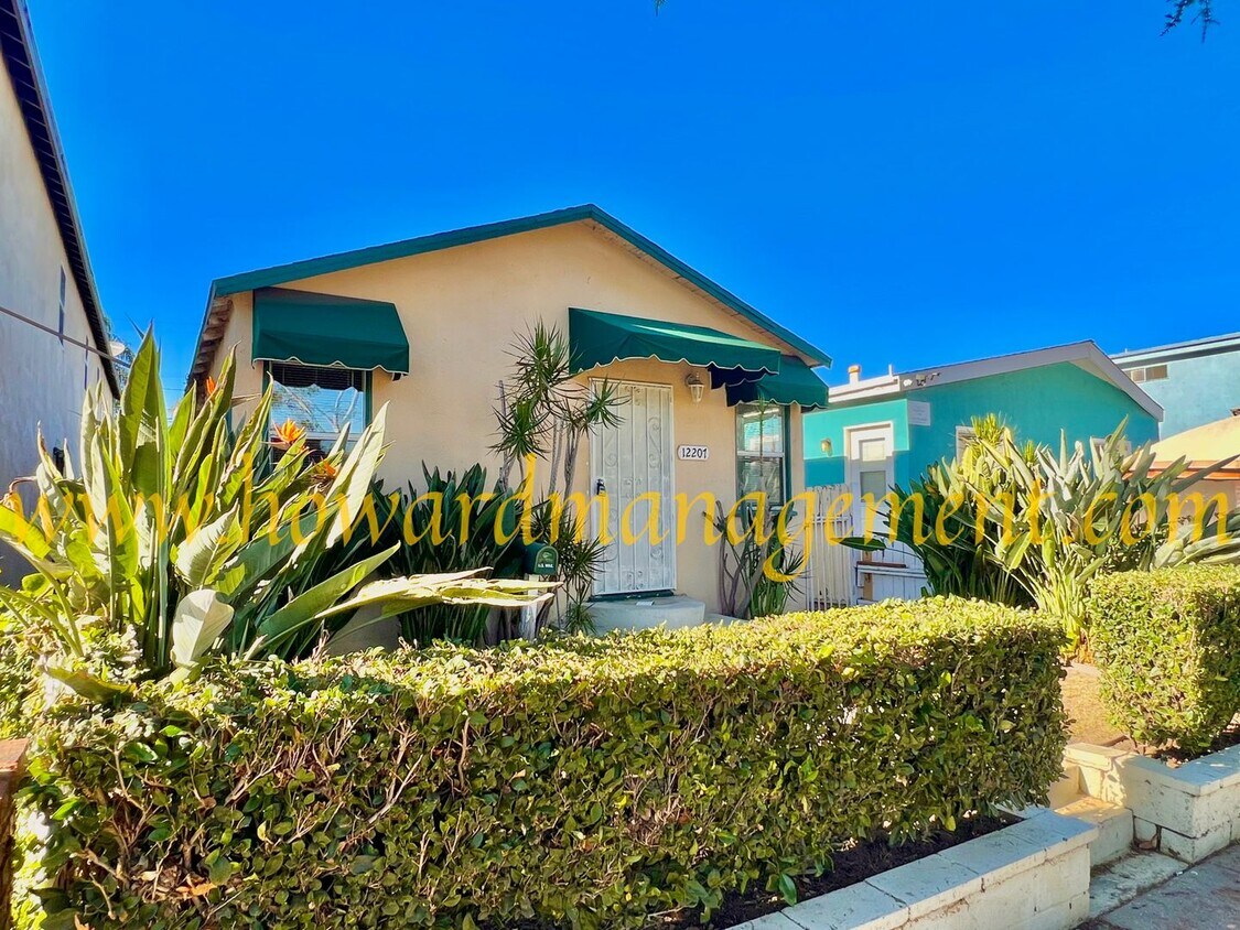 Primary Photo - Coveted West Side Gem: Your Ideal Home Awa...