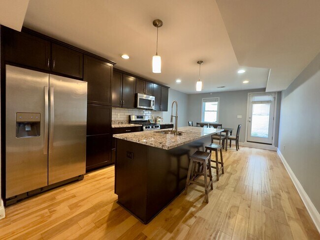 Building Photo - Modern 2-Bedroom Townhome with Private Dec...